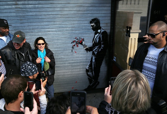 Banksy and the crowds. Photo by carnagenyc.