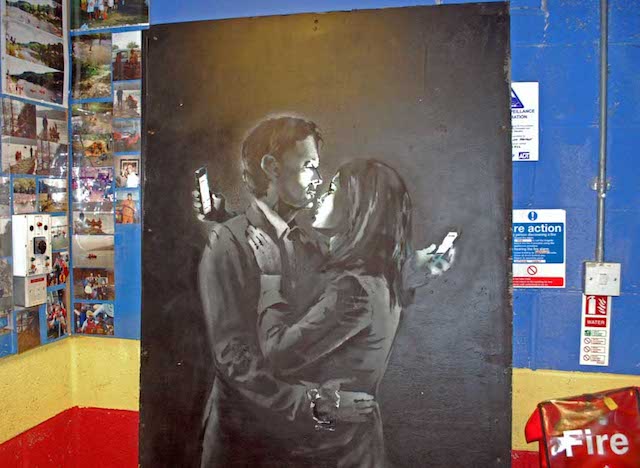 Detail of Banksy's piece once moved inside the youth center. Photo by Banksy Locations & Tours.