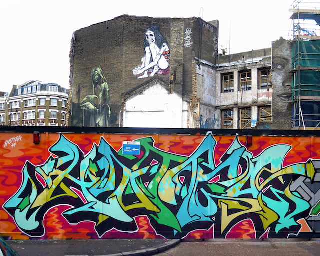 Another view of Faith47 and Satterugly with Australian artist Rone to the left and Hottea's first-rate graffiti