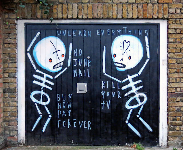 Irish artist Skeleton Cardboard with a message
